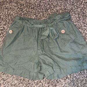 Small green stretch shorts from Maurice’s with matching belt.